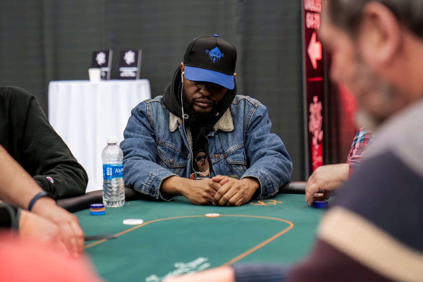 Black poker snapback hat featuring a bold embroidered ‘Gamble Drip’ design in striking lettering.