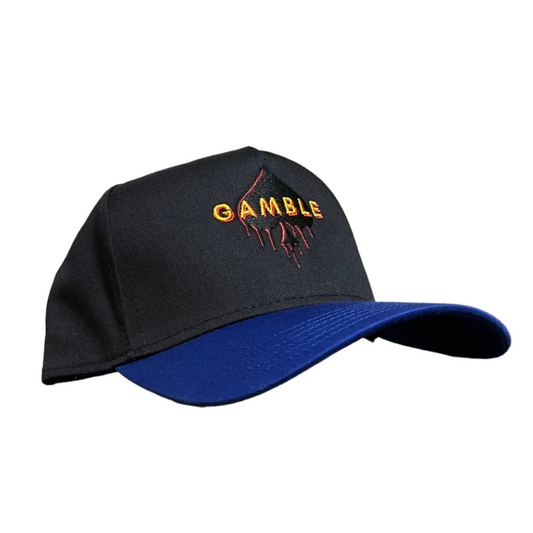 Spade Drip Snapback in blue and black featuring an iconic spade logo, made with high-quality materials for durability. Perfect poker hat for players who want to showcase their poker lifestyle.
