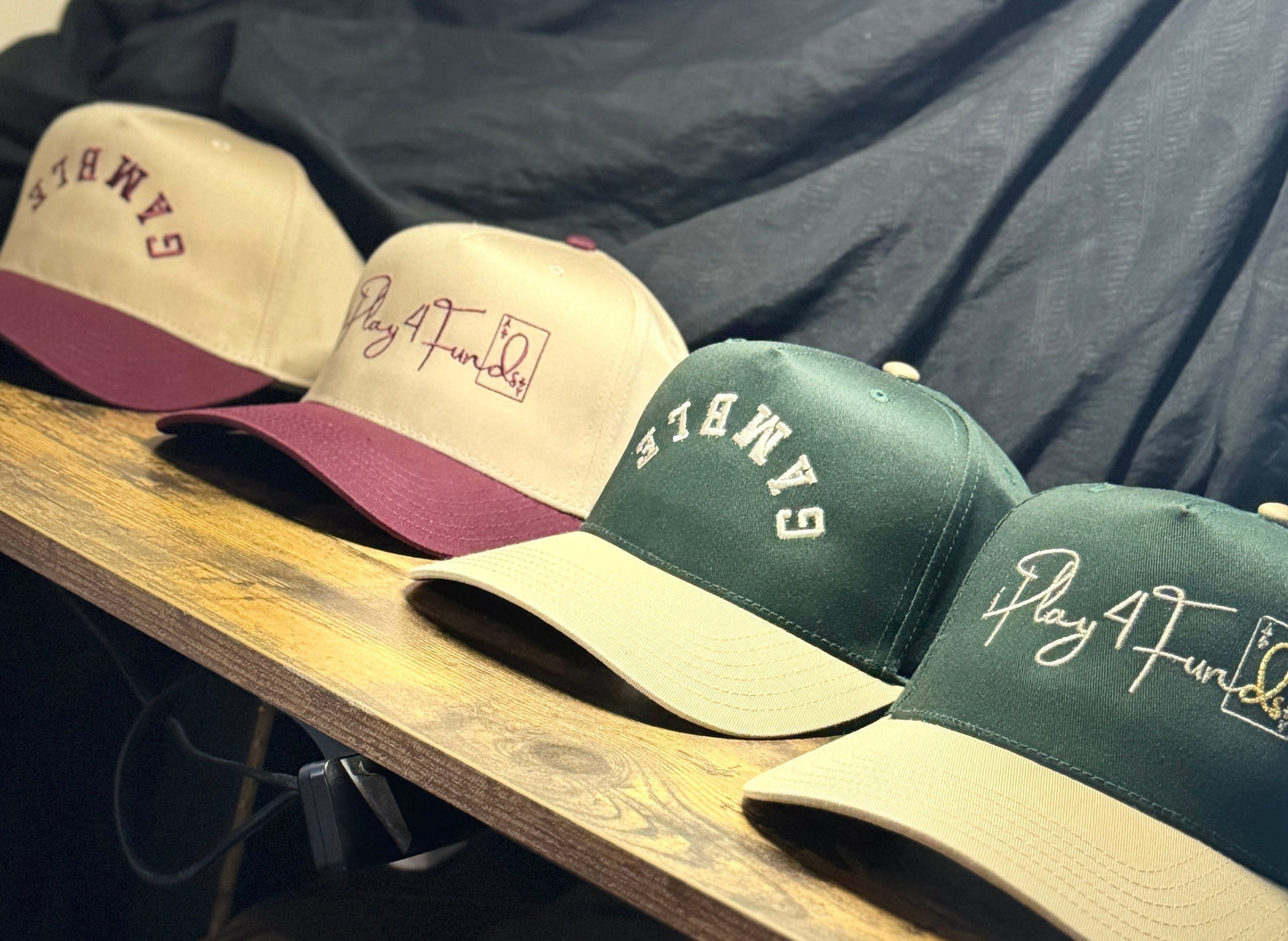 Green and tan poker snapback featuring the bold “I Play for Funds” statement. A stylish addition to your poker apparel collection, this adjustable hat offers a comfortable, custom fit for poker players who want to rep their love for the game.