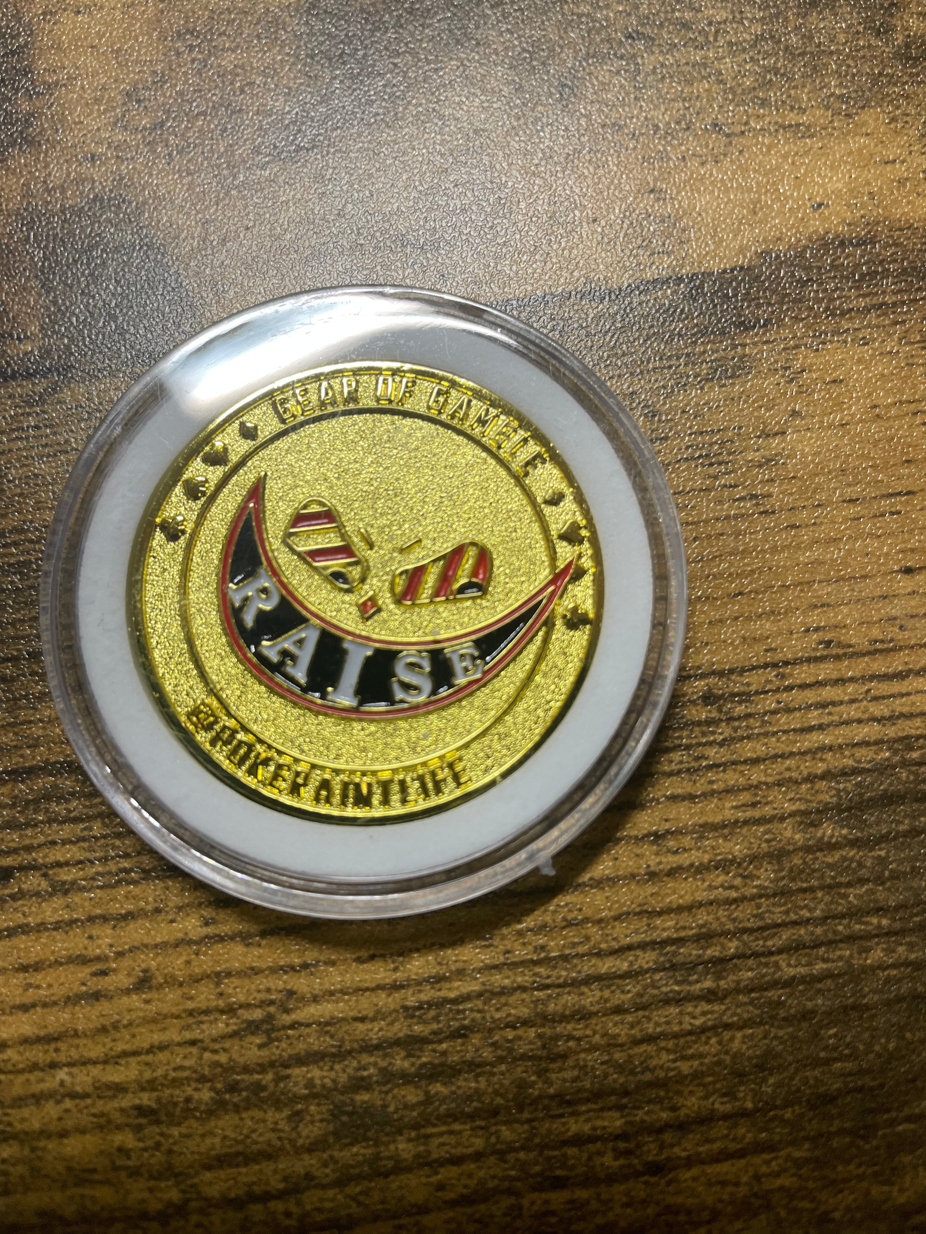 Premium metal poker card protector with ‘Raise’ art on side. Perfect poker accessory to protect your cards while adding style to your poker gameplay. A must-have for serious poker players.