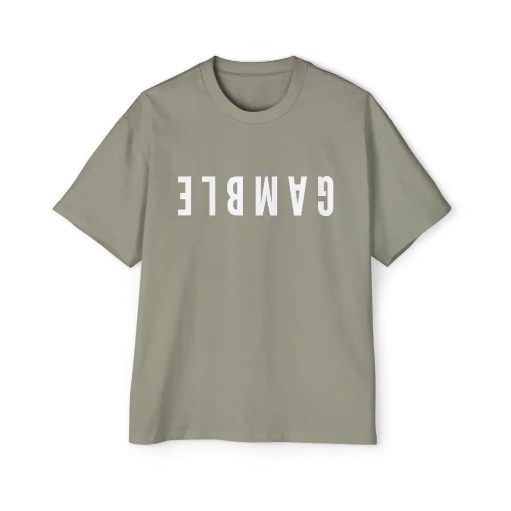 A teal oversized t-shirt with the word 'GAMBLE' printed in white letters on the front. Thick. Comfy.