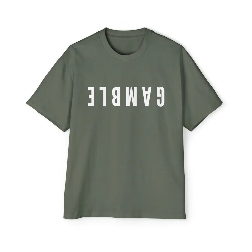 A green oversized t-shirt with the word 'GAMBLE' printed in white letters on the front. Thick. Comfy.