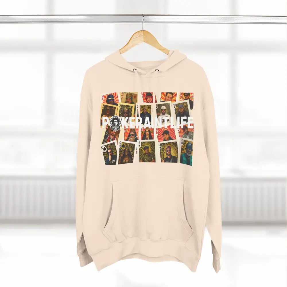 Beige hoodie with graphic design on a hanger against a neutral background