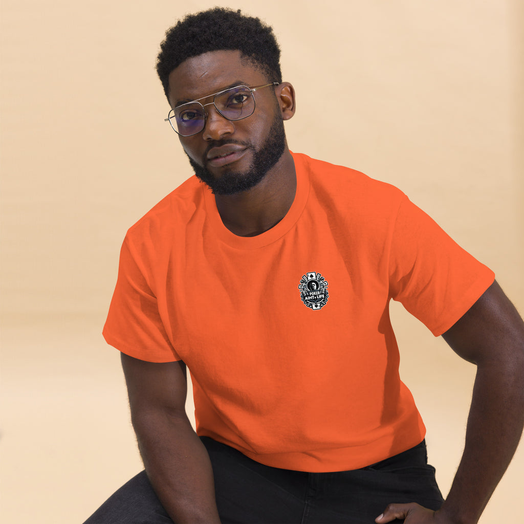 orange poker apparel t-shirt featuring the bold Poker Ain’t Life logo on the front, crafted from 100% soft cotton for all-day comfort. Perfect poker clothing for grinders