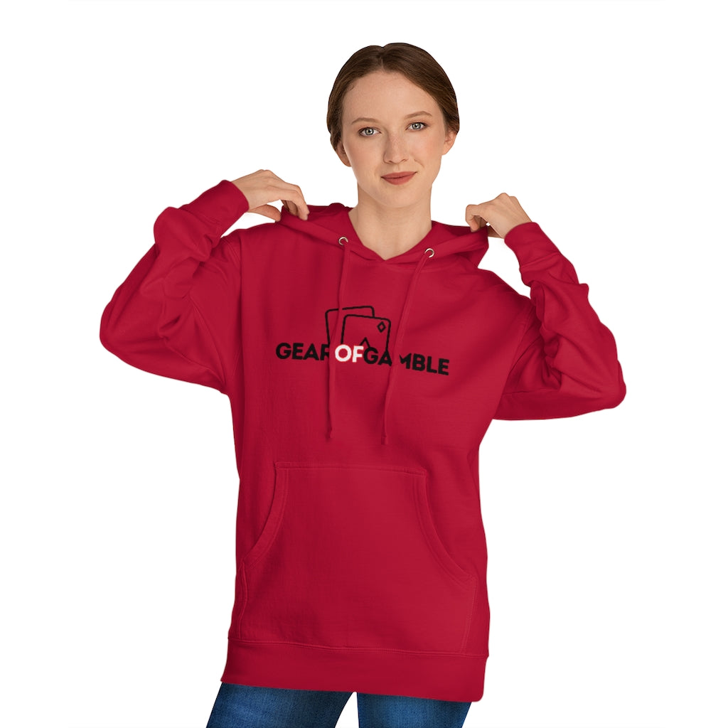 Man wears red poker hoodie featuring the bold Gear of Gamble logo on the front. Made from a soft cotton blend for ultimate comfort during long poker sessions, perfect poker apparel for players who want to rep their poker lifestyle